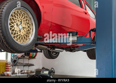 Oldtimer car on the lift Stock Photo