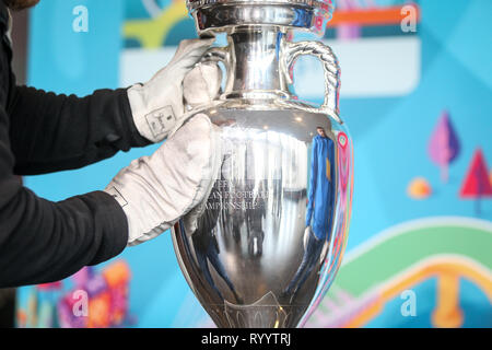 Bucharest, Romania - March 16, 2019: The original UEFA Euro 2020 tournament trophy is being cleaned before being presented to the public on the Nation Stock Photo