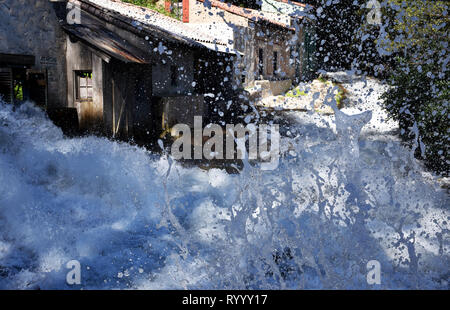 Los Angeles, USA. 13th Mar, 2019. Water overflows a village during the Mandarin VIP Experience tour at the Universal Studios Hollywood in Los Angeles, the United States, March 13, 2019. Universal Studios Hollywood has introduced Mandarin-speaking tours on a weekly basis in a bid to attract more Chinese visitors. Credit: Li Ying/Xinhua/Alamy Live News Stock Photo