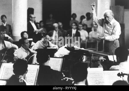 Beijing, China. 16th Mar, 2019. File photo provided by the Philadelphia Orchestra shows Eugene Ormandy, the orchestra's music director, joining a rehearsal with Chinese musicians during their first journey to China in 1973. Credit: Xinhua/Alamy Live News Stock Photo