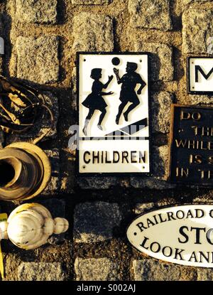 Playing children, vintage road sign Stock Photo