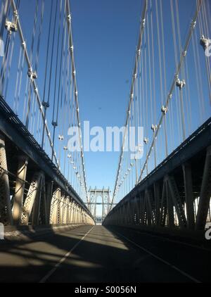 NEW YORK, USA. 17 February, 2014. Manhattan Bridge crossing, Brooklyn to Manhattan. Stock Photo