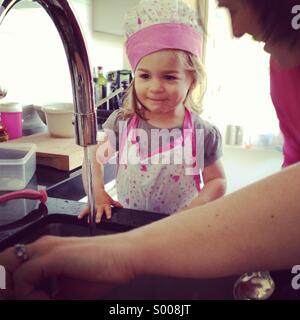 Little girl cooking Stock Photo