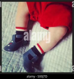 Little baby boy in vintage outfit and shoes. Stock Photo