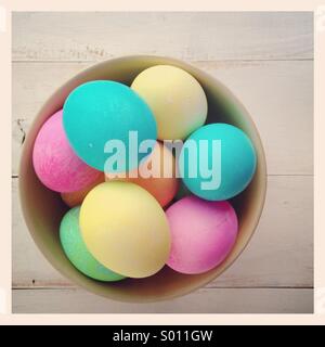 Dyed Easter eggs in a bowl Stock Photo