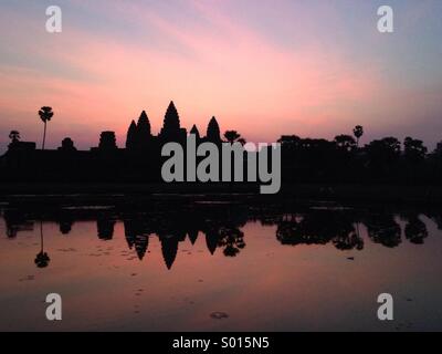 Silhouette of Angkor Wat during sunrise in Siem Reap Cambodia. Stock Photo