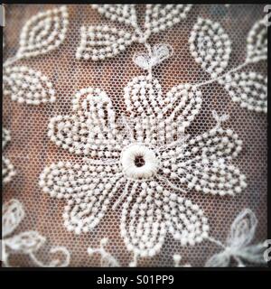 Antique Lace on Wood Surface Stock Photo