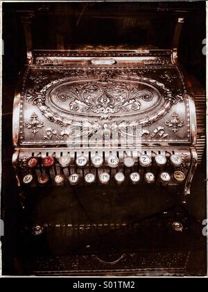 Old-fashioned cash register Stock Photo