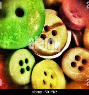 Magnified Buttons (Image taken through a hand lens) Stock Photo