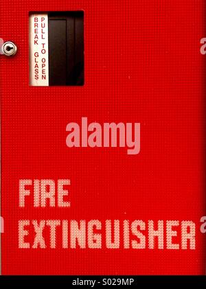 Fire extinguisher. Break to open. Stock Photo