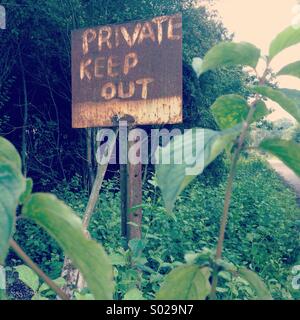 Red neck warning, old keep old sign Stock Photo