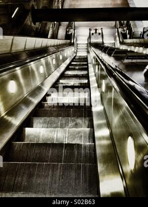 Looking down a deserted escalator Stock Photo