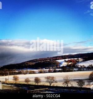 A snowy scene in Scotland with blue skies Stock Photo