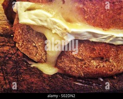 Ripe Brie on bread Stock Photo