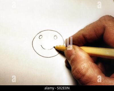 Drawing smiley face Stock Photo