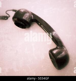 Old telephone receiver Stock Photo