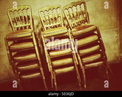 After the party, stacked chairs Stock Photo