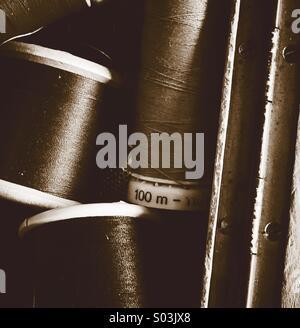 Detail of Cotten reels in 1950's sewing box Stock Photo