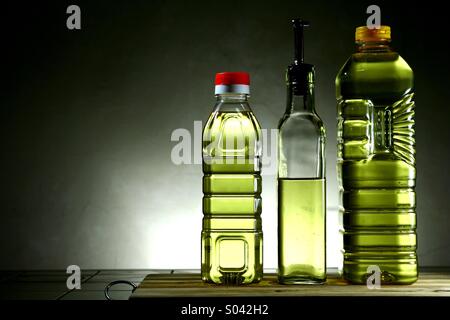 Cooking oil in different bottles Stock Photo