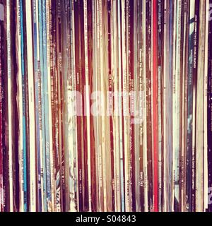 A collection of vinyl LPs on a shelf full frame close up Stock Photo