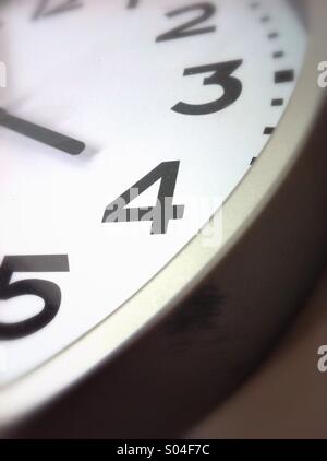 Number 4 on clock face. Stock Photo