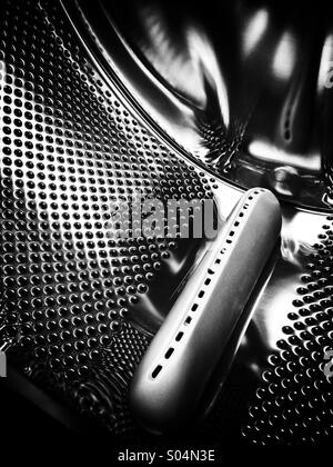 Interior of a washing machine drum Stock Photo