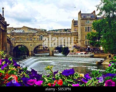 Bath's famous Pulteney Bridge viewed from Parade Gardens, with floral display for 'Bath in Bloom' event. Stock Photo