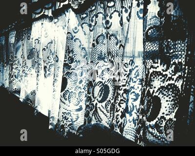 Lace curtain window Stock Photo