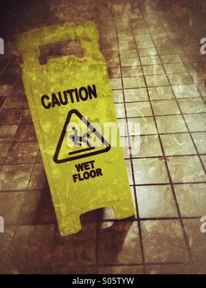 Wet floor warning sign. Stock Photo