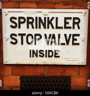 Sprinkler Stop Valve Inside sign. Stock Photo