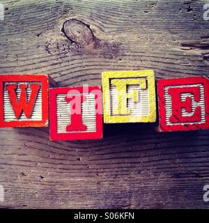 It's a photo of woodblocks toys will alphabet letter on them which are combines together to create the word WIFE Stock Photo