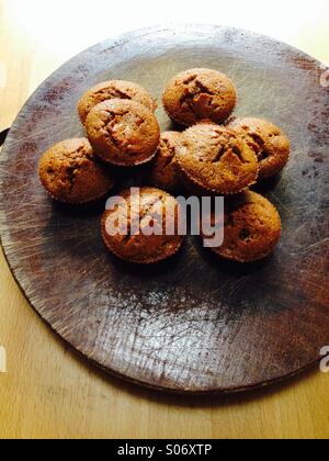 Home made coffee flavoured cup cakes on traditional wood background Stock Photo