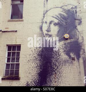 Banksy's Girl with a Pierced Eardrum Stock Photo