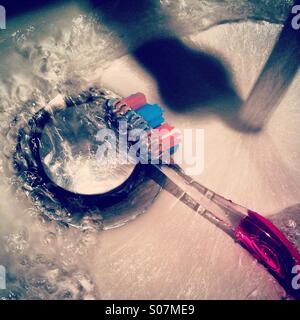 Cleaning the toothbrush in the sink Stock Photo