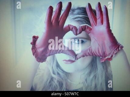 Girl with red leather gloves Stock Photo