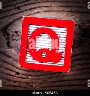 Letter W on a wood block Stock Photo