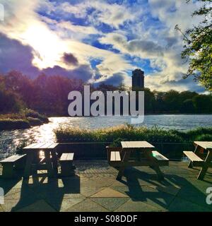 Wooden tables and benches in Hyde park, London Stock Photo