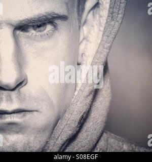 Angry male looking at camera with copy space Stock Photo