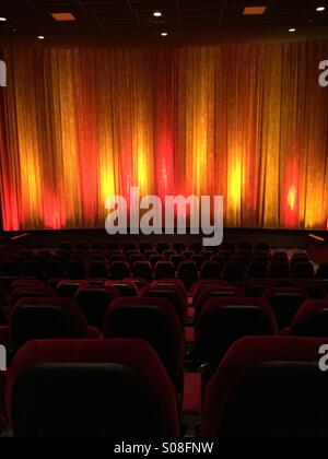 The curtain of a movie theater before the film starts Stock Photo