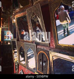 Mirrors on sale in the souk of Marrakech medina, Morocco. Stock Photo