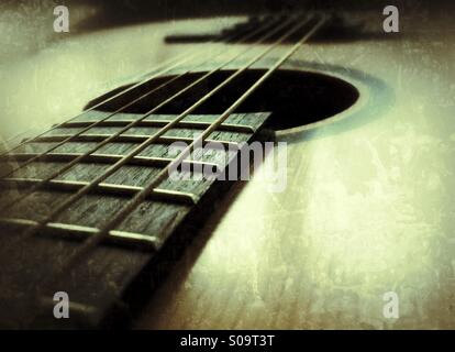 Close-up of the steel strings on a classic guitar. Stock Photo