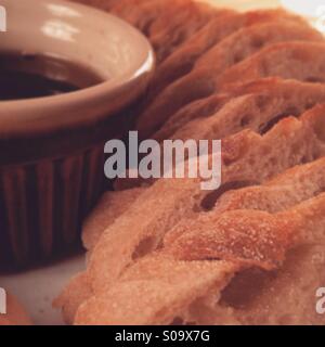 Homemade fresh ciabatta bread with oil & balsamic vinegar. Stock Photo