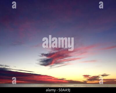 Clouds over the ocean just after sunset. Manhattan beach, California USA. Stock Photo