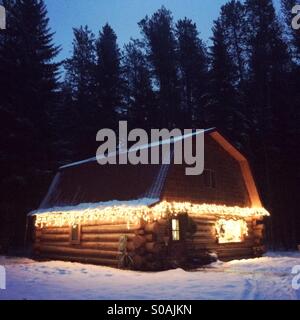 A beautiful log cabin in the woods of Montana. Stock Photo