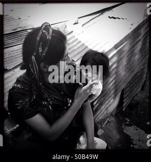 Maya indigenous mother and daughter on San Antonio Palopo, Guatemala. Stock Photo