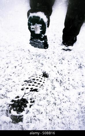 Footsteps in the snow. Stock Photo