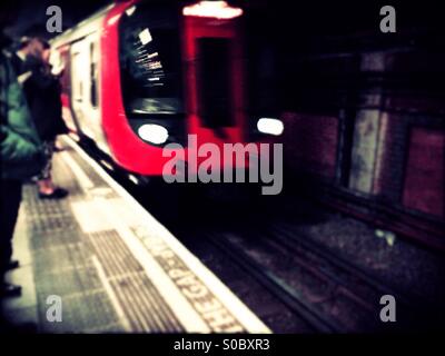 Hammersmith & City line train arriving at platform, City of Westminster, Central London, England, United Kingdom, Europe Stock Photo