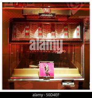 AMI Music jukebox from the 1950's with an Elvis Presley record at the McHenry Museum. Modesto, California, USA Stock Photo