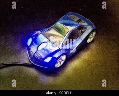 A computer mouse on the style of a car. Stock Photo