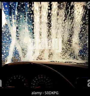 Going through a car wash. Stock Photo